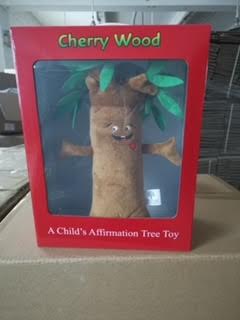 A Cherry Wood Soft Toy in a Red Color Box